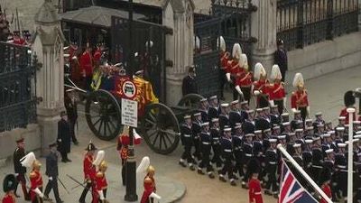 Queen’s coffin begins procession to Westminster Abbey for funeral
