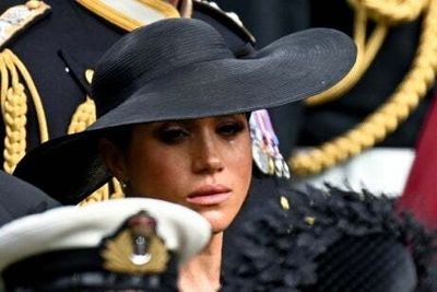 Emotional Meghan wipes away a tear at Queen’s funeral