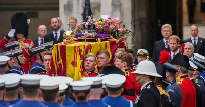 Dawn of a new era as Queen Elizabeth II is laid to rest with whole world watching