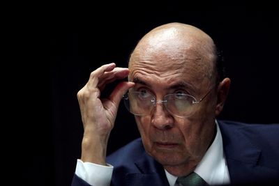 Brazilian ex-bank leader Meirelles says no talk of joining Lula but door open