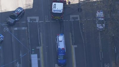 Man arrested after 'erratic behaviour' in Melbourne CBD had bottles full of water