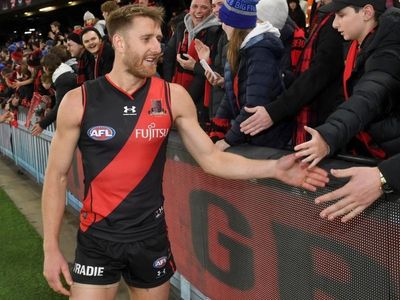 Essendon captain Dyson Heppell re-signs