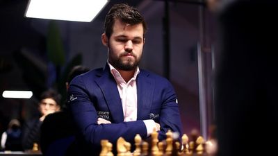 World champion Magnus Carlsen resigns after one move in online match against American Hans Niemann