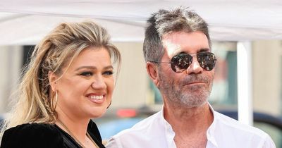 Simon Cowell and original American Idol judges reunite as Kelly Clarkson gets Hollywood star