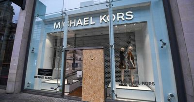 Man smashes through glass door at Michael Kors and steals designer items