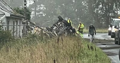 Car flips onto roof in horror crash on Scots road as emergency services race to scene