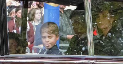 Cheeky Prince George seen sticking out his tongue on way to Windsor for Queen's funeral