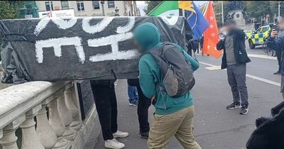 Protestors fling coffin marked 'RIP British Monarchy' into River Liffey on day of Queen's funeral