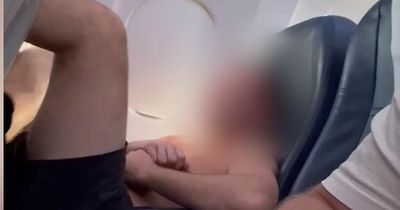 'Drunk' man who stripped off on Manchester flight to Turkey handed over to police