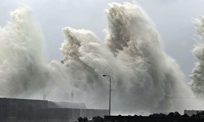 Warnings over floods and landslides in Japan in wake of Typhoon Nanmadol