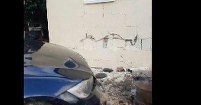 Dad 'heartbroken' after driver ploughs BMW into family home then flees when he tried to help