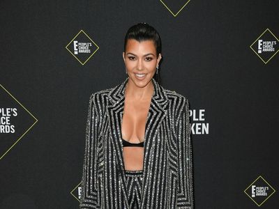 Kourtney Kardashian shuts down pregnancy speculation after posing in lingerie