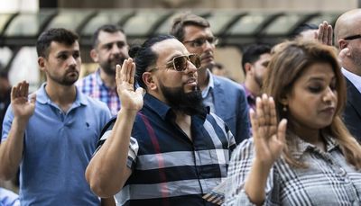 Naturalization ceremony in Daley Plaza results in 63 new U.S. citizens