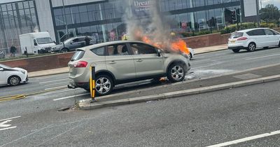 Car goes up in flames as fire fighters rush to Edge Lane