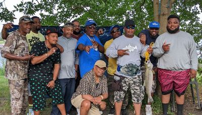 Sharing the fishing party for salmon during the Nightmare Fishing tournament at Jackson Park