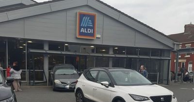 Aldi car park closed as car crashes into supermarket window