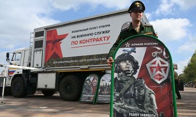 ‘I’d rather leave than fight’: Russians react to Putin’s draft