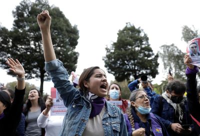 Demonstrators in Ecuador protest woman's killing, demand payment to pension system