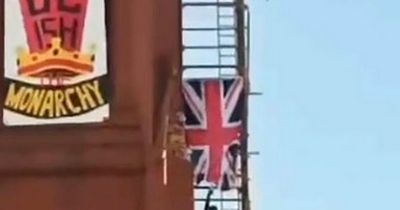 Outrage as Union Jack set on fire in protest during national day of mourning for Queen
