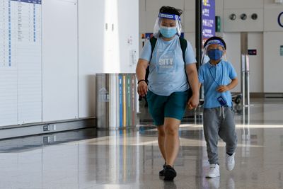 Hong Kong to scrap hotel quarantine for travellers from early Oct -media