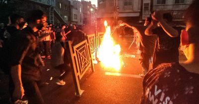 Protesters send police fleeing amid streets fires as riots enter sixth day