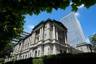 Japan central bank acts to stem yen's decline against dollar