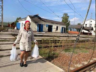 In a retaken border village, Ukrainians point to signs of Russian abuse of civilians