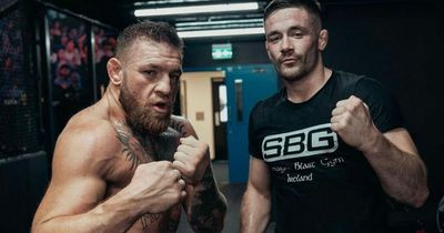 Conor McGregor looked "sharp" in return to training despite fears over injury