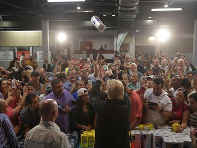Trump flinging paper towels at Puerto Rico residents resurfaces as Biden pledges full support after hurricane