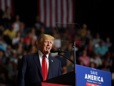 Trump news - live: Trump embraces QAnon memes on Truth Social ahead of North Carolina rally