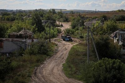 Family tries to rebuild life in shattered Ukraine village retaken from Russia