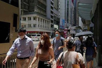 Hong Kong scraps hotel Covid quarantine measures for all travellers