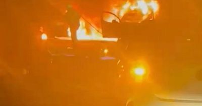 Heroes save pair from car seconds before it burst into flames in M4 crash