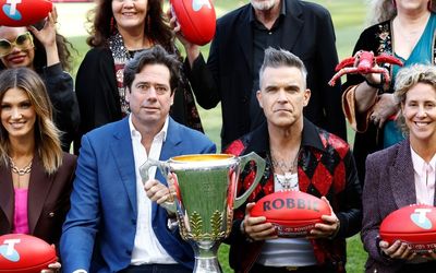 Barry Crocker to Robbie Williams: AFL grand final entertainment has gone in leaps and bounds