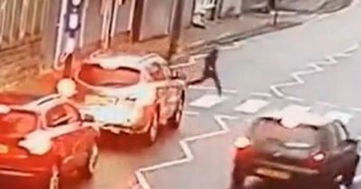 Shocking moment car tries to overtake queue of vehicles waiting for children to use a zebra crossing