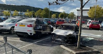 Car totally destroyed as fire spreads to second vehicle in busy car park