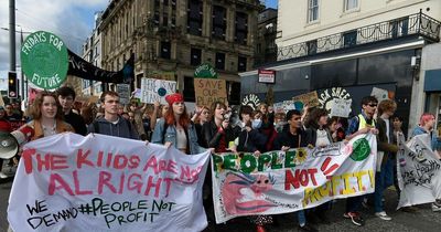 Hundreds of young people march through Edinburgh streets in mass climate protest