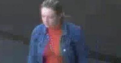 Mum racially abused in front of her kids at train station as CCTV of couple released