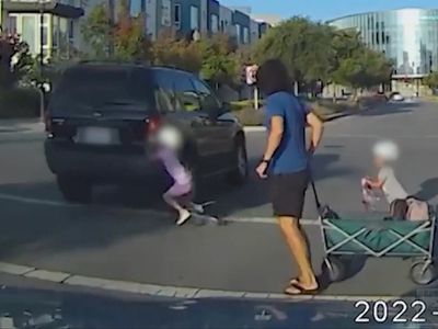 Terrifying video shows SUV narrowly missing girl crossing intersection