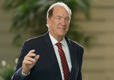 World Bank head says he's not a climate denier, won't quit