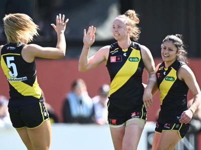 Tigers down AFLW-leading Lions in triller