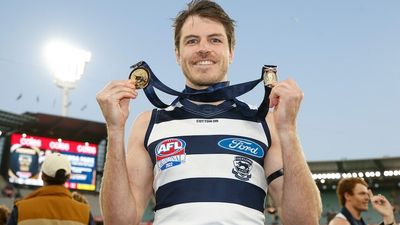 Isaac Smith's Norm Smith Medal a win for the 'silver foxes' as Geelong's veterans celebrate AFL premiership success