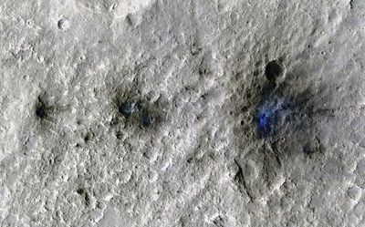 What clues do the newly formed craters on Mars reveal?