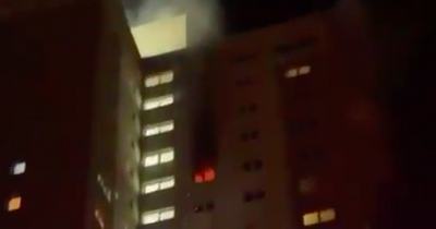Man rushed to hospital after fire rips through Glasgow high-rise flat