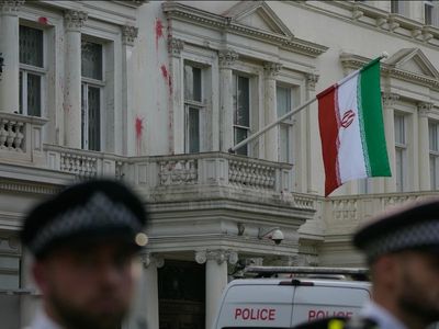 Protesters clash with police outside Iranian embassy in London
