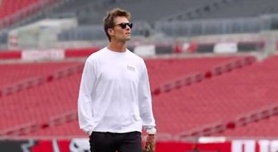 Tom Brady wore a shirt with a picture of himself as a kid on it and lots of NFL fans crushed him for it