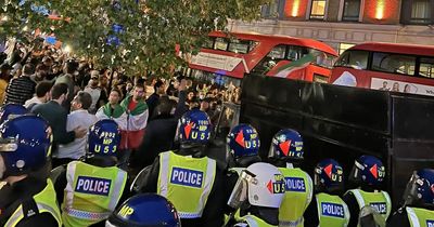 Five police officers suffer serious injuries as London protests turn violent