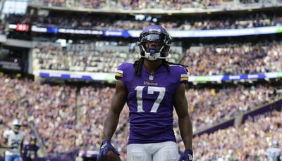 Touchdown in final minute lifts Vikings over Lions