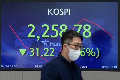Asian shares mostly decline echoing US slide on rate worries