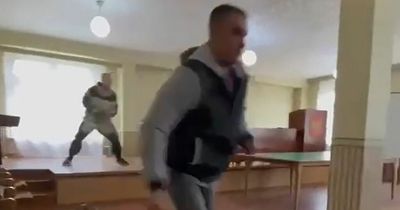 Gunman opens fire in Russian army office yelling 'no-one will fight' as men called up